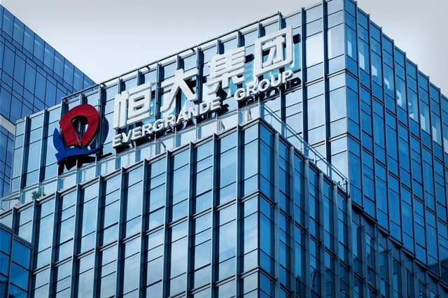 How the Evergrande Founder's $42 Billion Fortune Became a Guilty Plea